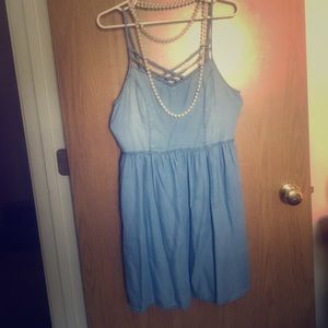 Jean dress with crisscross detail across the front